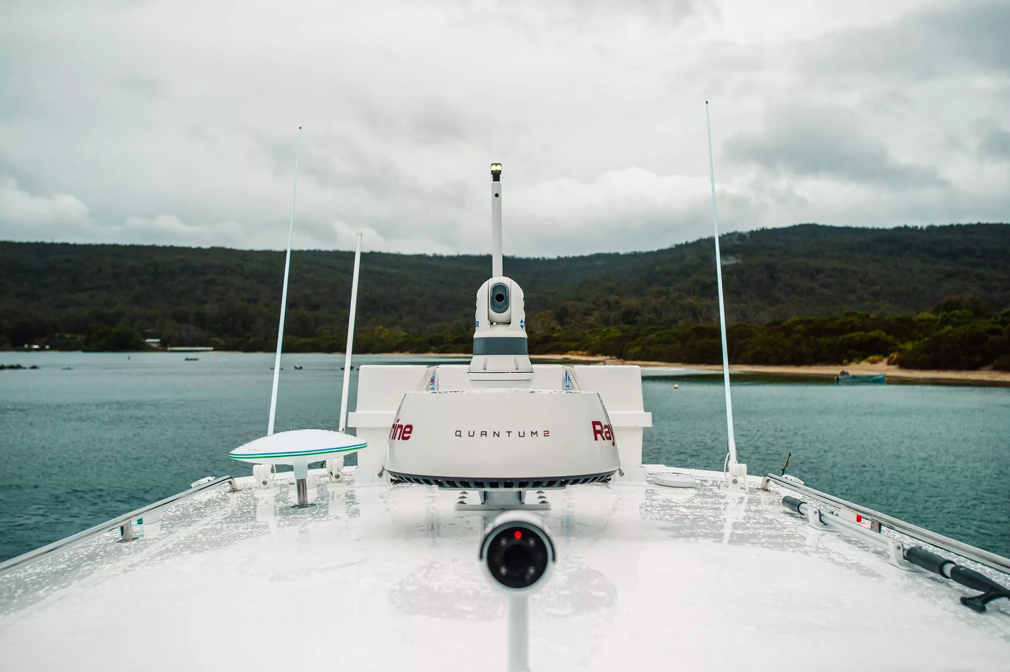 Raymarine Quantum marine radar on top of boat in a bay