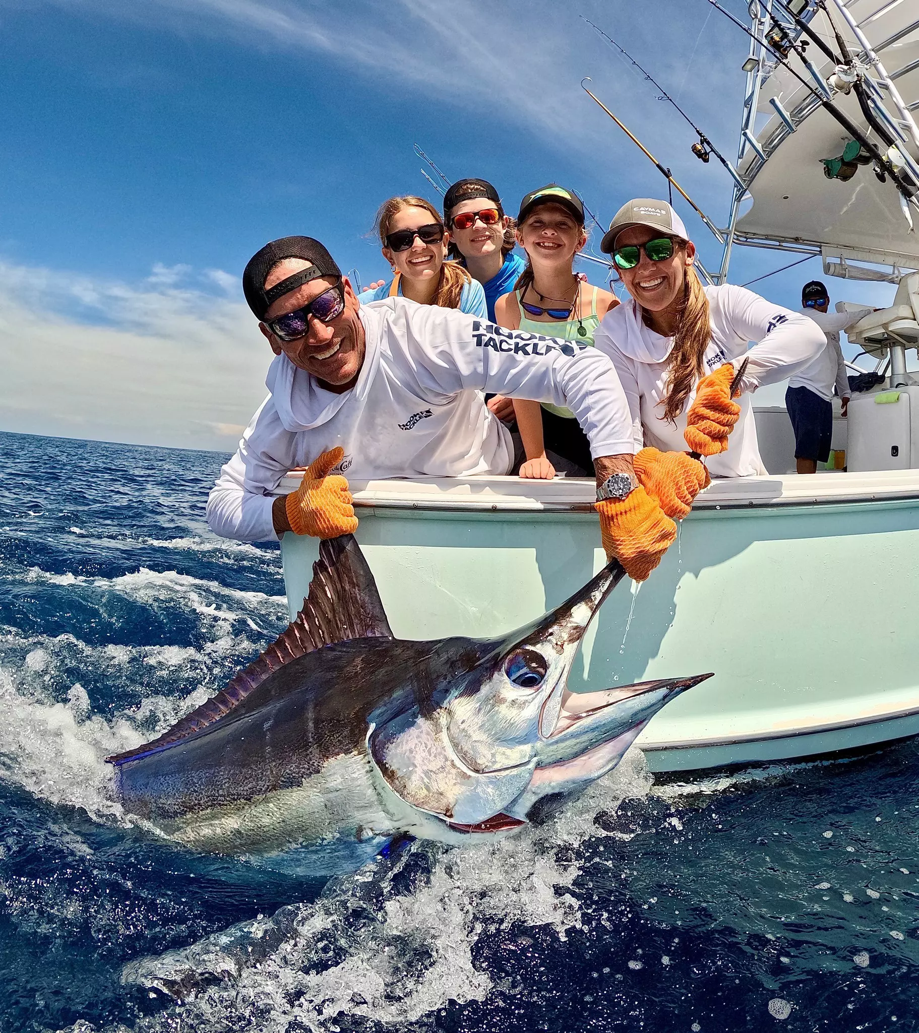 george gozdz lifting a marlin boatside