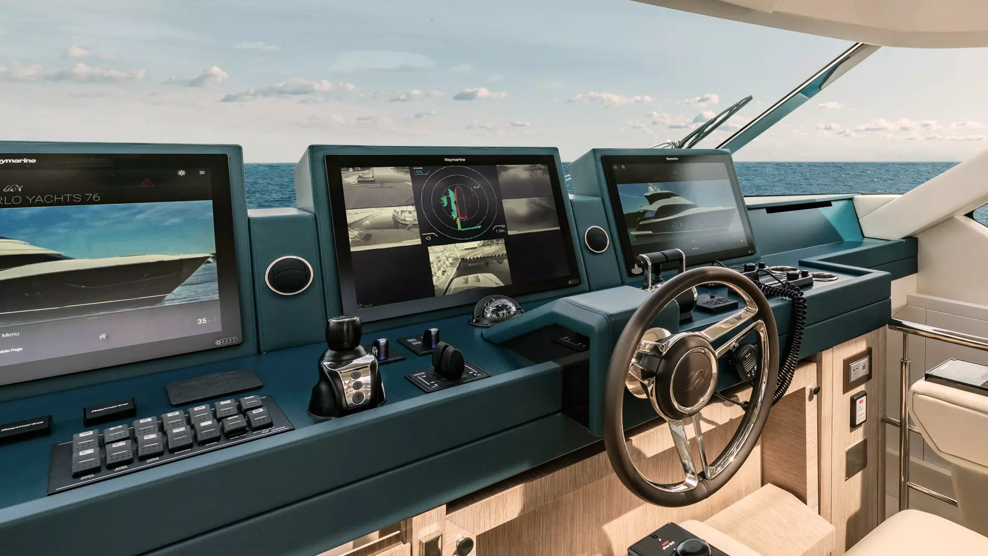Motorboat helm with Raymarine Axiom Chartplotters