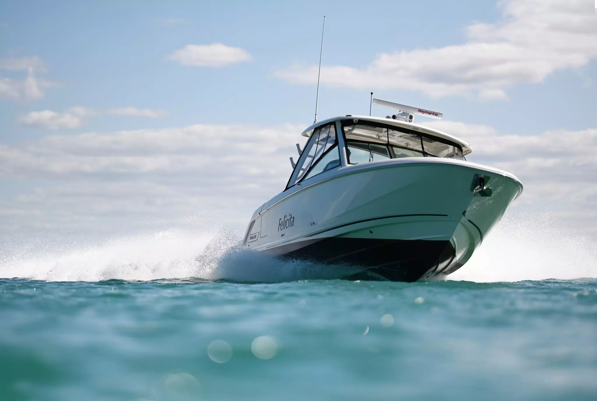 Outboard fishing boat with Raymarine gear