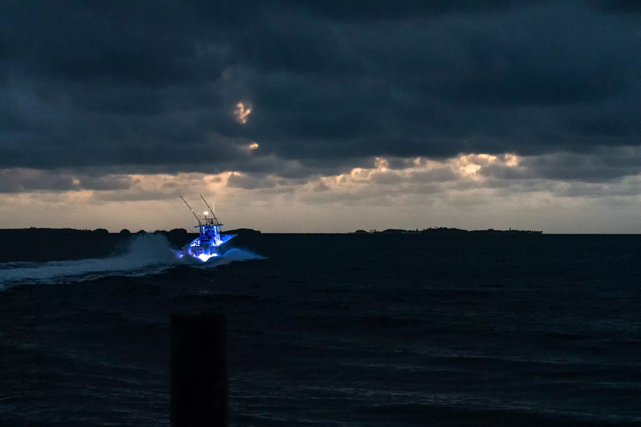 Center Console boat at night