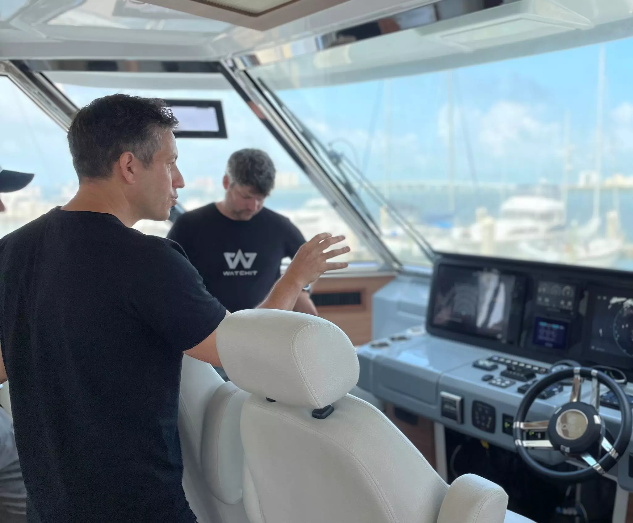 WATCHIT Integration on a boat helm with Raymarine Axiom Chartplotter displays.